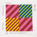A colorful geometric patterned needlepointed kit. Designed and sold by Daisy’s Needlepoint Kits.